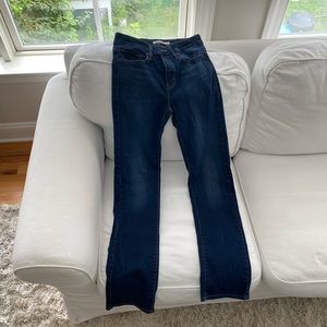 Levi’s high waisted slimming straight dark blue jeans